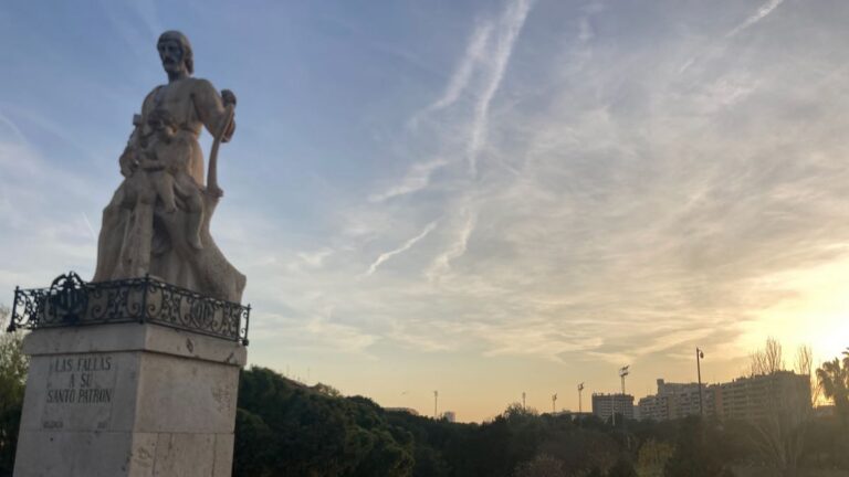 Sunset over a bridge in Turia Park in Valencia