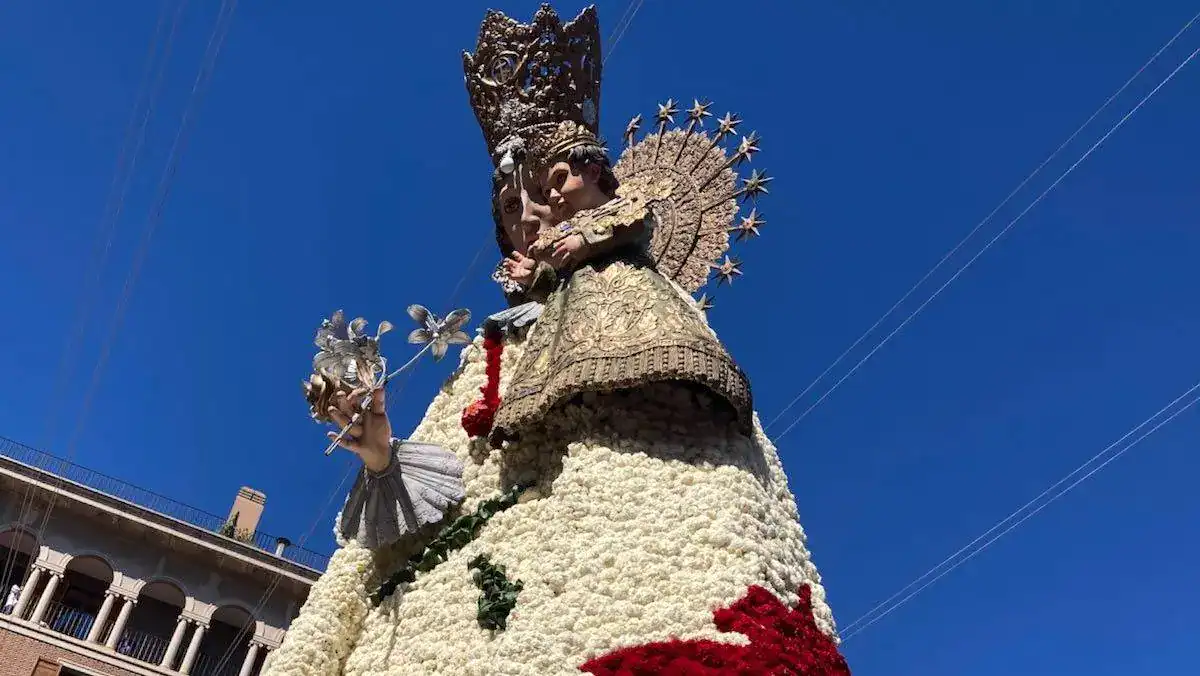 The flower-studded figure of the Virgin Mary during the La Ofrenda tradition during Valencia's Fallas