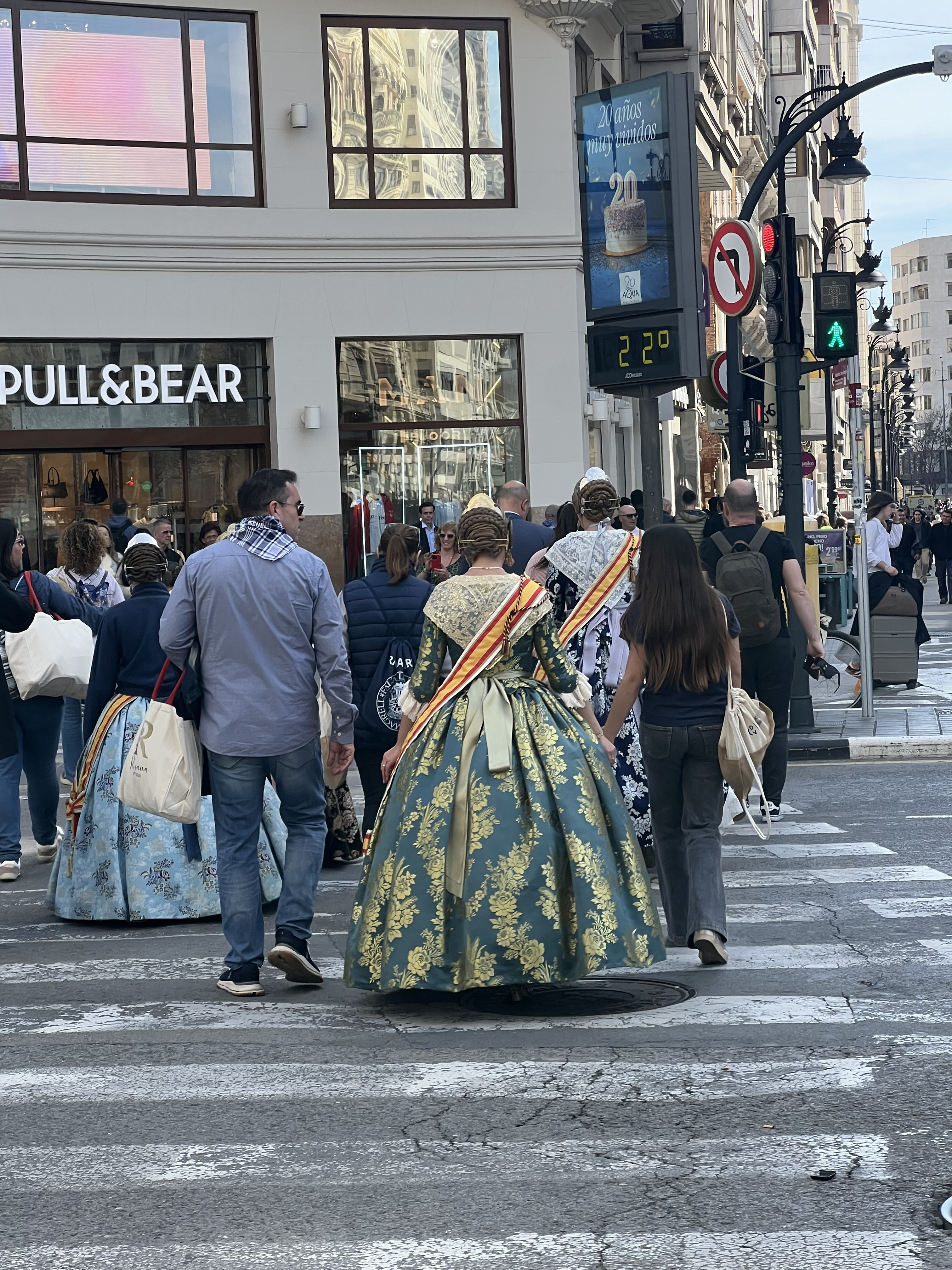 Falleras crossing the street in Valencia.