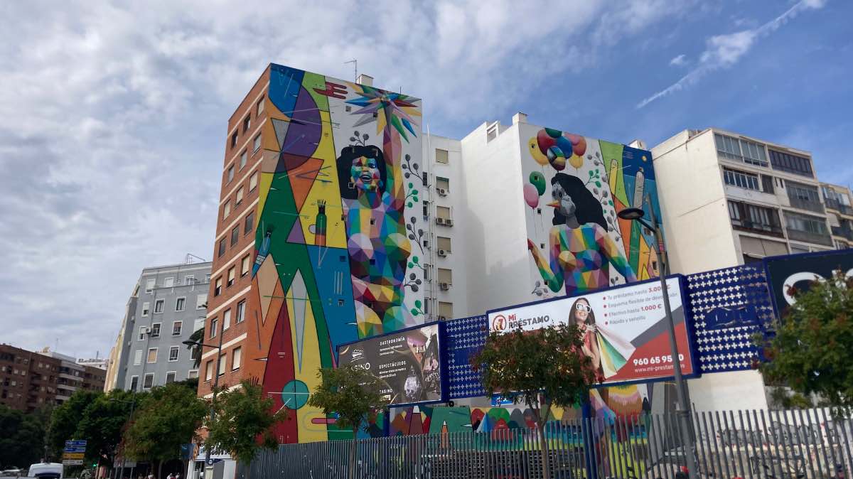 Colorful street art covers two apartment blocks across from Joaquin Sorolla station in Valencia